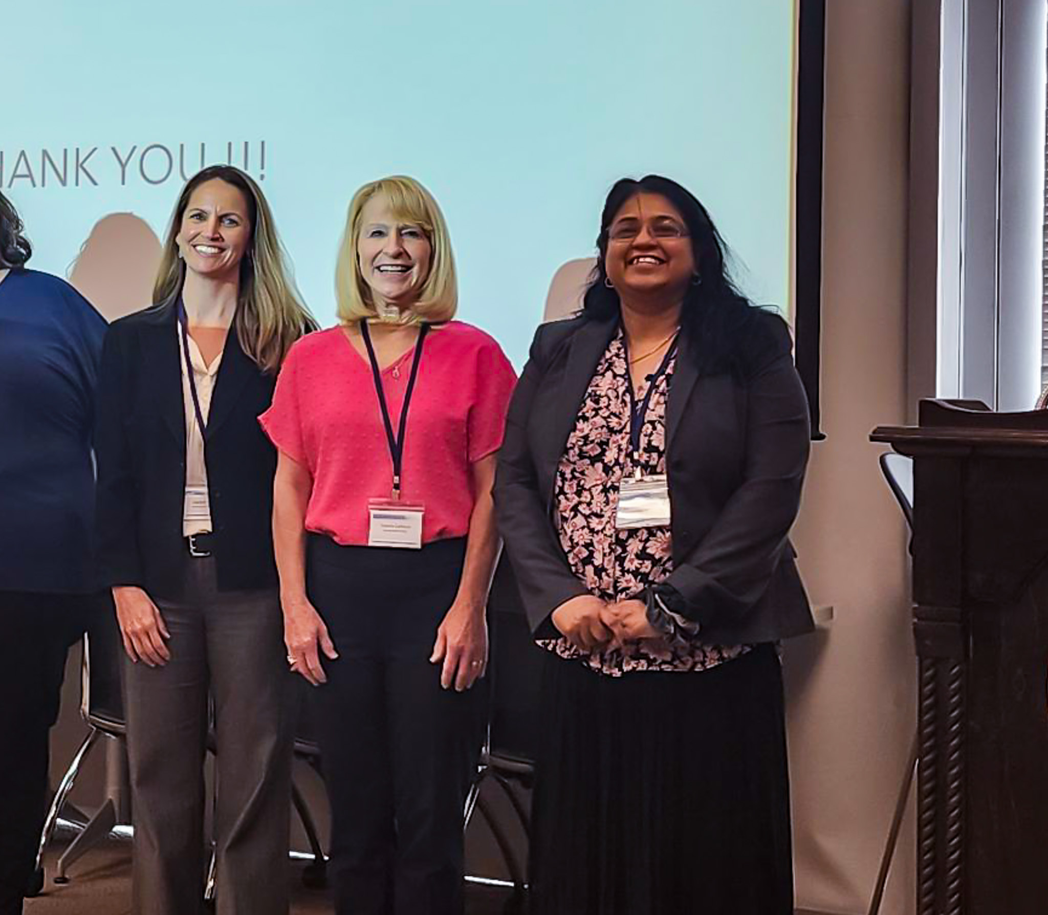 (Center): Dr. Valerie Calhoun