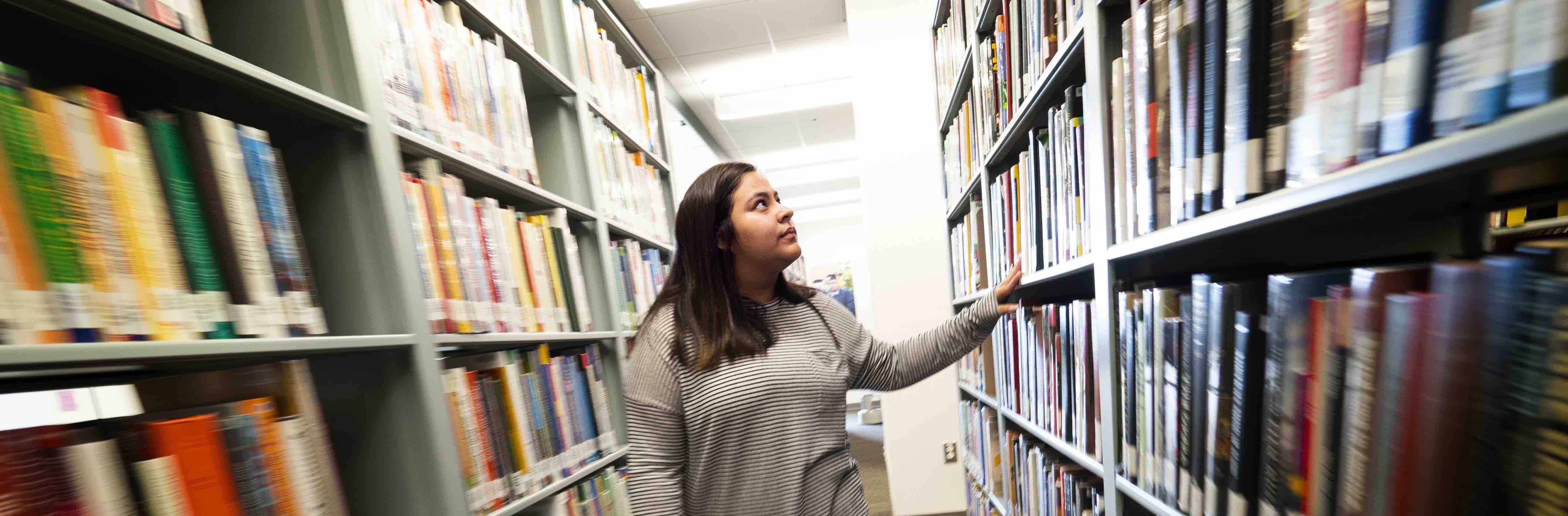 student-in-stacks-library-c.jpg